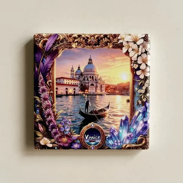 Italy Venice fridge magnet, ceramic tile showing a gondola on the Grand Canal at sunset below a domed basilica in an ornate floral frame