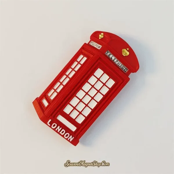 Angled view of London telephone box souvenir magnet showing 3D relief door panes and narrow side window