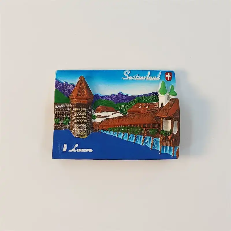 Front view of Lucerne Chapel Bridge fridge magnet with Water Tower, alpine peaks, and blue Reuss River