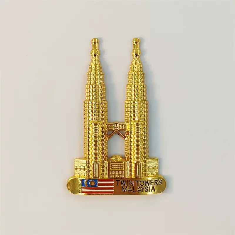 Gold Petronas Twin Towers fridge magnet with Malaysian flag and Twin Towers Malaysia text