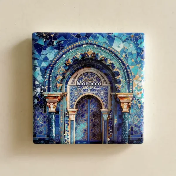Front view of a square Morocco fridge magnet with a hand-painted blue mosaic arch and zellige tile design