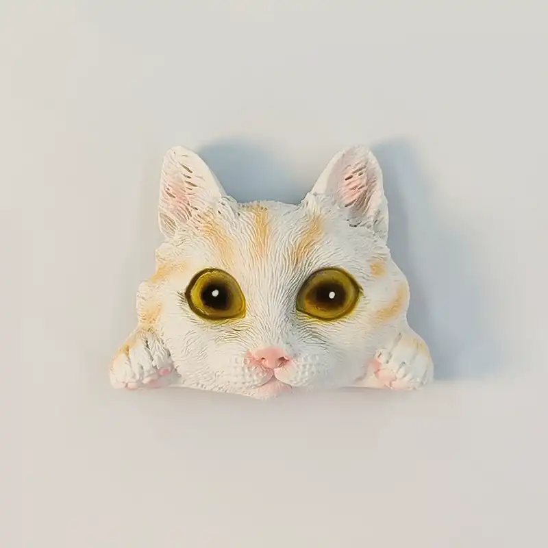 peeking-cat-cute-fridge-magnet-front Peeking cat cute fridge magnet, white kitten with ginger markings, big amber eyes and paws on the edge, front view