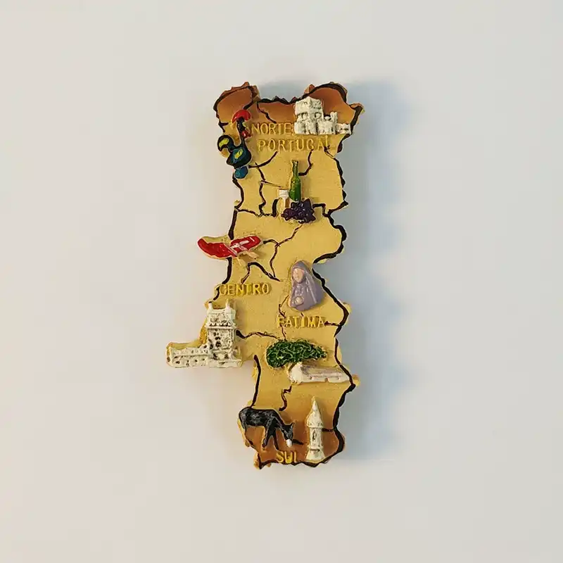 portugal-map-fridge-magnet-front Front view of Portugal map fridge magnet with hand-painted 3D Barcelos Rooster, Fatima figure and castle relief