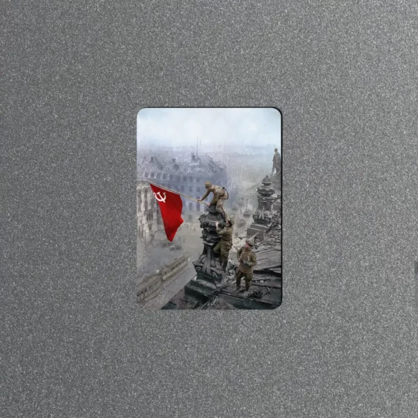 Vintage fridge magnet showing the colorized WWII photo of a Soviet soldier raising a red flag over the ruined Reichstag in Berlin