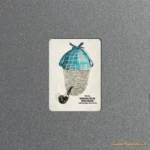 Retro Sherlock Holmes fridge magnet with a fingerprint face, teal checked deerstalker cap and pipe on cream card