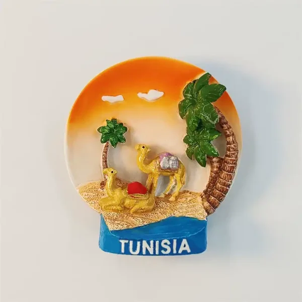3D Tunisia fridge magnet with two golden camels, palm trees and orange sunset over desert dunes