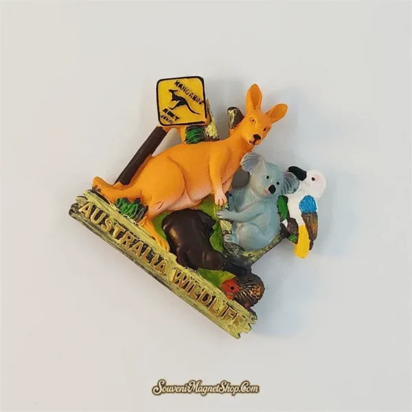 Side angle of the Australia wildlife fridge magnet showing the layered kangaroo, koala, kookaburra, wombat and echidna design.