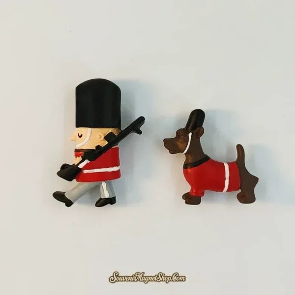 Angled view of the British Guard and Dog fridge magnet options with red coats, white trim, and separate figure shapes.