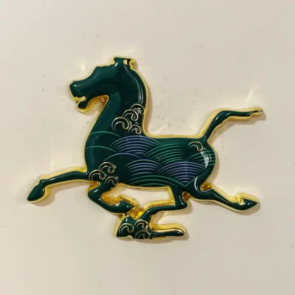 Gansu Museum Flying Horse 3D fridge magnet with a dark green horse, gold edging, and blue wave motifs.