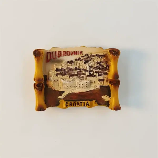 Dubrovnik 3D fridge magnet with a scroll-style frame, old-town waterfront, and DUBROVNIK and CROATIA lettering.