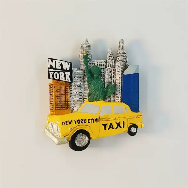 New York 3D fridge magnet with a yellow taxi, green Statue of Liberty, raised skyline, and NEW YORK sign.