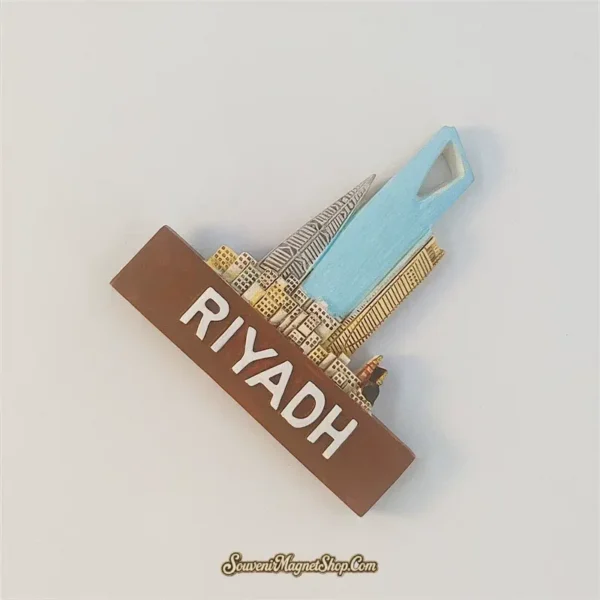 Riyadh skyline fridge magnet angled right, showing Kingdom Centre, neighboring towers, and the brown city-name base.