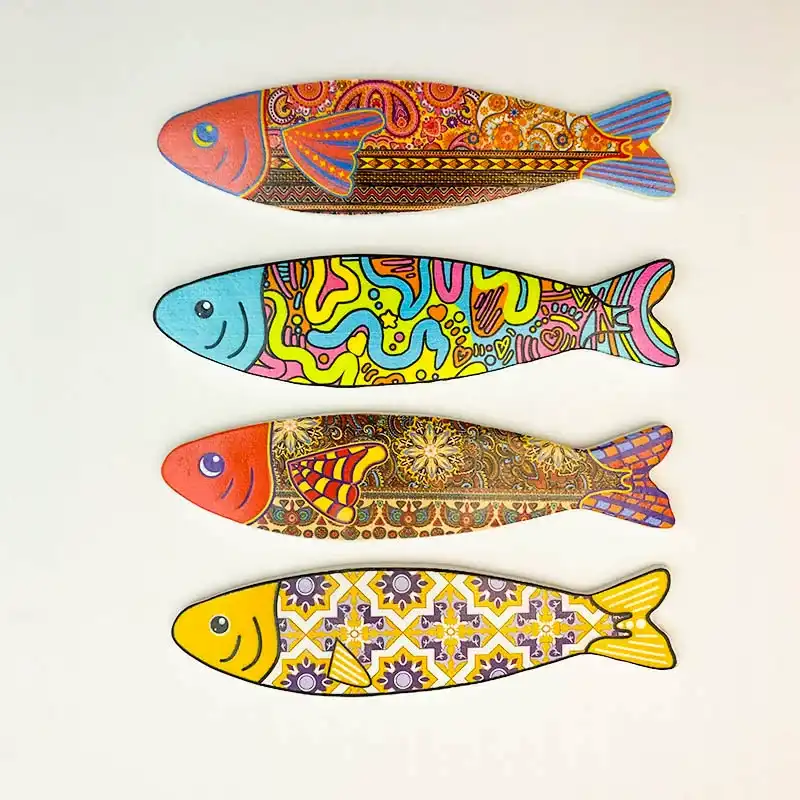 bohemian-fish-aesthetic-fridge-magnet-four-styles Four aesthetic fish fridge magnet styles: orange paisley, turquoise-faced graffiti, dark floral and yellow floral tile designs.