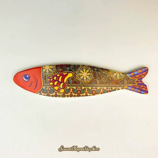 Bohemian Fish B fridge magnet with a red head, dark floral body, patterned fin and purple-and-orange checked tail.