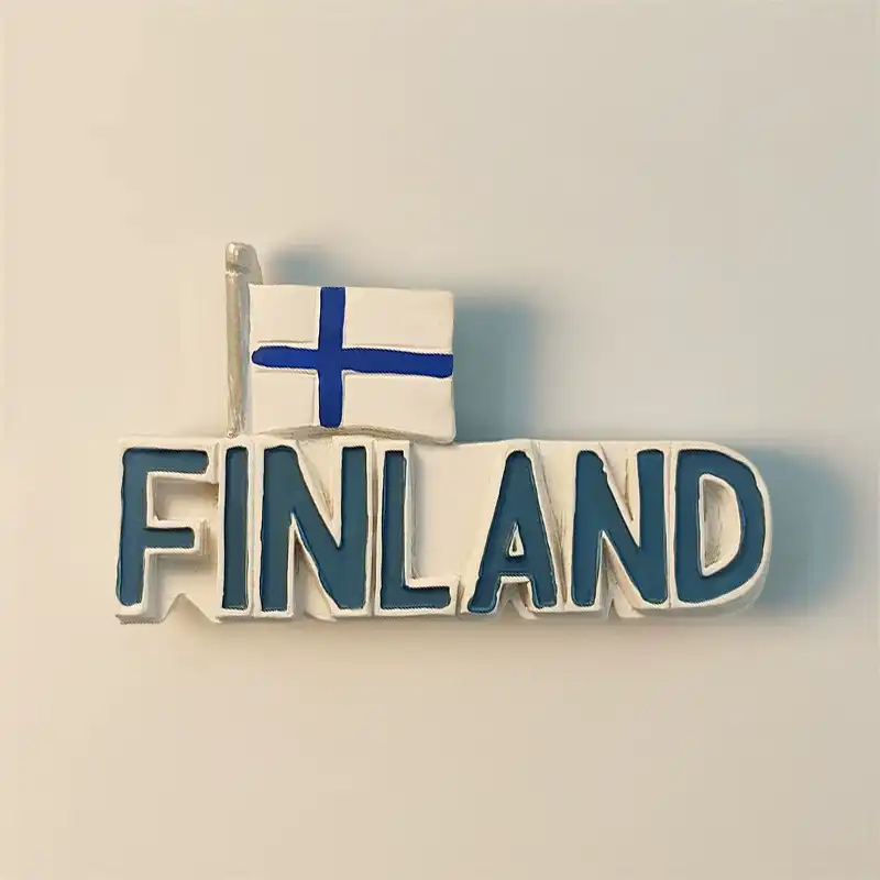 Finland letter fridge magnet with bold blue FINLAND text, white outlined base, and a Finnish flag above the first letters.
