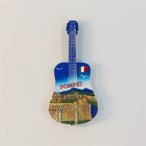 Pompeii guitar-shaped fridge magnet with ancient ruins, blue neck, Italian flag, and POMPEI lettering.