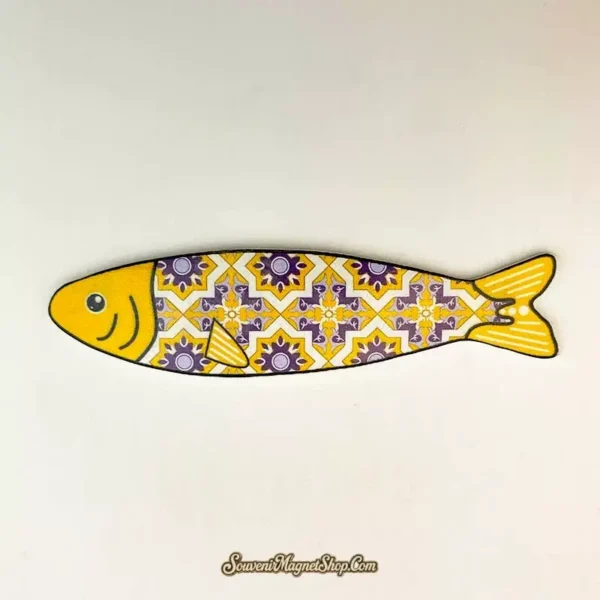 Yellow Tile Fish fridge magnet with a yellow face and striped tail surrounding purple-and-white floral tile patterns.